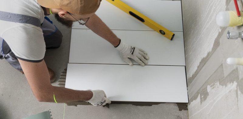 tiler-working-renovation-apartment